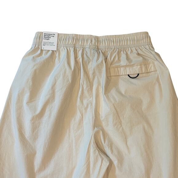 Nike Tech Woven Oversized Pants Mens Sz Medium Beige Straight Leg Stacked Length - Picture 3 of 12